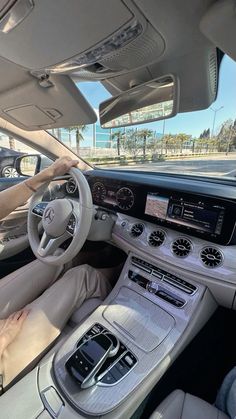 the interior of a mercedes benz s - class car with its dashboard and steering wheel