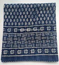 an old blue and white cloth with stars on it