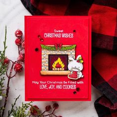 a christmas card with a fireplace on it