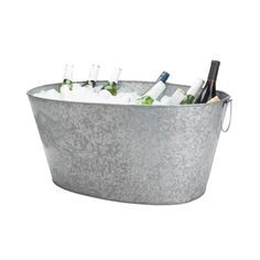 an ice bucket filled with bottles of wine and ice cubes on a white background