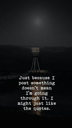 a lighthouse at night with the quote just because i post something doesn't mean i'm going through it