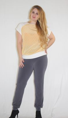 I made this lovely understated raglan sleeve top with a beautiful yellow woven printed cotton and a white cotton jersey fabric. It's relaxed fit makes it super comfortable to wear and yet so chic. It looks great worn over a pair of jeans or skirt. The top is professionally finished for durability, it's available in small, medium or large. Larger sizes can be made for an extra $20 pattern customization fee. Please specify size or simply send me your measurements in the message to the seller part Spring Raglan Sleeve T-shirt For Loungewear, Summer Stretch Raglan Sleeve Tops, Stretch Cotton Tops For Daywear, Casual White Stretch Blouse, Stretch Crew Neck Top For Daywear, Stretch Cotton Blouse For Everyday, White Stretch Short Sleeve Top For Spring, Everyday Stretch Cotton Blouse, White Stretch Blouse For Daywear