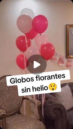 a living room filled with furniture and balloons in front of a wall that says globos florantes sin hello