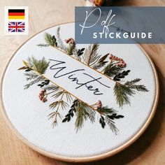 a cross stitch pattern with the words winter written on it