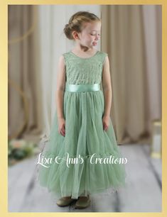 Embrace the bohemian bride in you with this enchanting Sage Green Flower Girl Dress. Its mermaid silhouette and boho-inspired details make it a must-have for any spring or Easter celebration. Be the talk of the town and let your flower girl and junior bridesmaids shine just as bright! Sage Flower Girl Dress, Toddler Flower Girl, Flower Girl Dresses Mermaid, Green Flower Girl Dresses, Sage Green Flowers, Style Sleeveless Dress, Boho Flower Girl, Mermaid Style Dress, Toddler Flower Girls