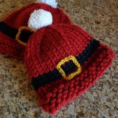 a knitted santa hat laying on top of a counter