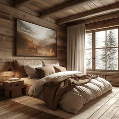 a large bed sitting in a bedroom next to a painting on the wall above it