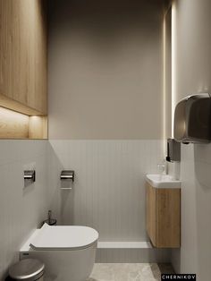 a bathroom with a toilet, sink and mirror on the wall next to each other