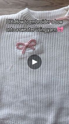 a video demonstrating how to embroider a t - shirt onto sweater using yarn