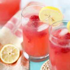 two glasses filled with lemonade and raspberry punch