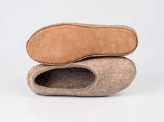 These flat slippers for women are handmade from natural sheep wool while their surface is decorated with fluffy alpaca wool. The model features colorful inner parts, non-slip soles, and hand-stitched labels from recycled leather. Alpacas grow soft & spongy fleece that has a natural crimp. Therefore alpaca's fibers are a bit warmer and less itchy than sheep wool. When paired with sheep wool, alpaca's fiber turns into extra soft and warm felted items that also maintain their sturdiness and durabil Flat Slippers For Women, Alpaca Slippers, Boots With Leg Warmers, Fluffy Alpaca, Felted Wool Slippers, Felt Shoes, Flat Slippers, Wool Slippers, Home Slippers