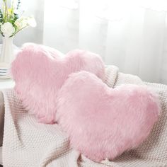 PRICES MAY VARY. Package Content: you will receive 2 pieces heart shaped pillows, which are available in pink color, bright and vivid; There's a zipper that takes out the inner core, rich content and enough quantity to meet your use and replacement needs Proper Size: the size of each cute throw pillow measures about 50 x 40 cm/ 20 x 15.7 inches, proper size to decorate your sofa, chair, car, bed, office, and more, suitable for indoor and outdoor use Soft Material: one side of these aesthetic pil Light Pink Pillows, Shaped Pillows, Kids Living Rooms, Heart Pillows, Plush Cushion, Winter Pillows, Faux Fur Throw Pillow, Heart Pillow, Fur Throw Pillows