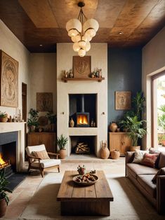 a living room filled with furniture and a fire place in the middle of the room