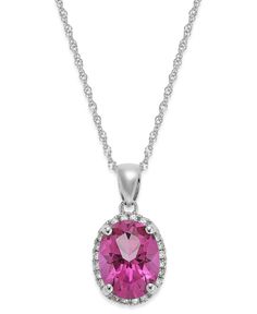 Feel the magic! This pink topaz (2 ct. t.w.) oval pendant is offset by diamond accents for a glamorous touch. Necklace set in 14k white gold. Approximate length: 18 inches. Approximate drop: 5/8 inch. Formal Oval Necklace With Accent Stones, Formal Necklace With Oval Pendant And Accent Stones, Formal Oval Pendant Necklace With Accent Stones, Elegant Birthstone Jewelry From Macy's, Diamond Necklace With Round Cut Accent Stones, Diamond Necklaces With Round Cut Accent Stones, Classic Round Necklace With Accent Stones, Macy's Elegant Birthstone Jewelry, Elegant Macy's Birthstone Jewelry