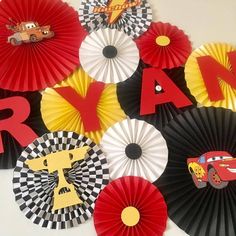 paper fans are arranged in the shape of cars