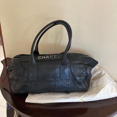 Chanel Chico Lax Leather Bag Quilted Comes With Dust Bag And Id Card Pre Owned Good Condition But Some Minor Damage One Flap Missing Stain On Inside Chanel Jumbo Flap Bag, Black On Black Chanel Bag, Chanel So Black Flap Bag, Chanel Vintage Classic Double Flap Bag Quilted Lambskin Medium, Chanel $95.00 Bag, Chanel Bags, Leather Bag, Satchel, Dust Bag