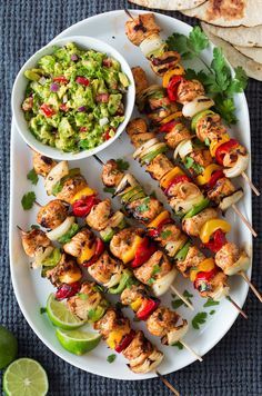 chicken kabobs with guacamole salsa and tortilla chips