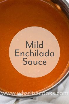 a sauce in a pot with the words mild enchilada sauce