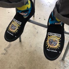 Rock out with these custom Sublime all black slip on vans. We buy each pair of shoes BRAND NEW. Each pair is made to order, please make sure you put in the correct shoe size before you check out. The ink is permanent and will never come off, fade away, or peel off. Made in the USA. This price includes everything: shoes and artwork. Each pair of shoes is made-to-order and takes 2-3 weeks to ship usually. Because the artwork is custom-made for you, there are no exchanges or returns. Please know yo Urban Slip-on Skate Shoes For Streetwear, Streetwear Slip-on Skate Shoes With Vulcanized Sole, Urban Slip-on Canvas Shoes For Streetwear, Slip-on Skate Shoes For Streetwear With Round Toe, Slip-on Skate Shoes With Vulcanized Sole For Streetwear, Skateboarding Slip-on Sneakers With Rubber Sole, Streetwear Slip-ons With Rubber Sole And Round Toe, White Sole Slip-on Custom Sneakers For Streetwear, Black Slip-on Canvas Shoes For Streetwear