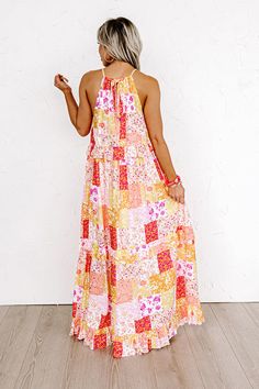 We have no doubt you will love this unique maxi dress featuring lightweight breezy material patterned with a red, coral, peach, mustard, and light pink hued floral patchwork print, a rounded neckline, skinny shoulder straps that tie across the upper back, ruffled accent seams, and a relaxed tiered silhouette that cascades into a straight ankle-length hemline! Measurements S : Bust 36", Hip 50", Length 51", Waist 40". M : Bust 38", Hip 52", Length 51.5", Waist 42". L : Bust 40", Hip 54", Length 5 Summer Multicolor Maxi Dress With Floral Patchwork, Multicolor Floral Patchwork Maxi Dress For Summer, Sleeveless Maxi Dress With Floral Patchwork For Spring, Summer Pink Patchwork Maxi Dress, Pink Patchwork Maxi Dress For Summer, Multicolor Floral Patchwork Maxi Dress For Vacation, Sleeveless Floral Patchwork Maxi Dress For Summer, Summer Patchwork Pink Maxi Dress, Pink Floral Print Maxi Sundress