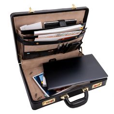 This slim leather attaché case is crafted to be the perfect accessory for the high class professional. It's made from premium top grain cowhide leather. This means only the very top grade of leather is used in the construction of this attaché briefcase. This top layer is the most durable and will last the longest of any leather cuts. Imperfections are buffed and sanded out to give the leather of this briefcase a beautiful premium feel. A premium look and a grade designed to last a lifetime. This Luxury Business Briefcase With Interior Card Slots, Luxury Briefcase With Interior Card Slots For Business, Professional Briefcase With Leather Lining For Business Trips, Professional Smooth Grain Briefcase For Business, Professional Business Briefcase With Leather Lining, Professional Smooth Grain Briefcase For Business Trips, Professional Briefcase With Smooth Grain For Business Trips, Classic Briefcase With Interior Card Slots For Work, Classic Briefcase For Work With Interior Card Slots