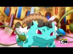 an animated image of a blue and white pokemon character holding a green object in front of a