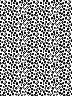 an abstract black and white background with small circles in the shape of dots on it