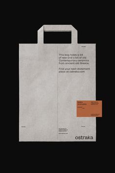 an advertisement for ostraka on the side of a white bag with orange tags