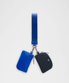 two luggage tags attached to a lanyard strap