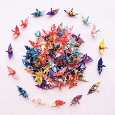 PRICES MAY VARY. What's in the box-- 1 Bag of 100pcs with about mix color (random), Yuzen paper, great quality. (if make to be garland, you need to connect the paper cranes by yourself by using fishing or cotton line, also can be as party favor/supplies/confetti). Hang them on walls, trees, tables, windows or door to add dazzling atmosphere to twinkle themed birthday party, classroom party, new years party or other party. or put them on the party table. Unique Design-- This crane made by 1.57" s Tea Party Supplies, Origami Wedding, Party Table Centerpieces, Cute Origami, Easy Paper Crafts Diy, Fiesta Baby Shower, Paper Supplies, Baby Shower Party Favors, Origami Crane