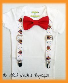 a red bow tie and suspenders on a white t - shirt with polka dots