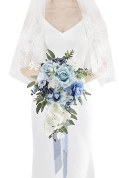 PRICES MAY VARY. Size: 18 inches high, 11 inches in diameter. Material: The main flowers of the wedding bridal rose bouquet are silk dusty blue roses, dotted with white rose, navy roses, orchid, anemone, beriies, acrylic crystal, eucalyptus leaves ,white daisy. Delicate Dusty Blue Wedding Bouquets: the bouquet comes in elegant, romantic and tender tones: dusty blue, light blue, grey, white, navy blue and green. These neutral colors are subtle and roamntic, they attract with their coziness and fe Teal Wedding Bouquet, Bouquet For Wedding, Vintage Boho Wedding, Bridal Bouquet Blue, Cascading Bridal Bouquets, Eucalyptus Bouquet, Wedding Party Flowers, Blue Wedding Bouquet, Dusty Blue Wedding