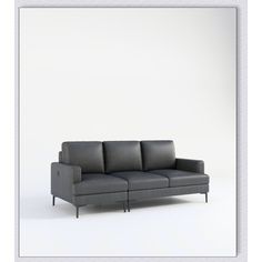 a gray couch sitting on top of a white floor