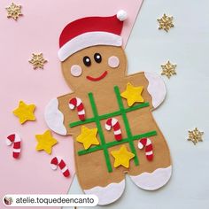 a gingerbread cut out with christmas decorations