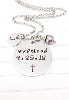 "Stamped with \" baptized\", a unique and personalized baptism gift for adults and teens who decide to be baptized along with the date of baptism and a cross stamp. Please leave date in \"note to seller\" box at checkout. The date will be only stamped in format \"6.18.17\" due to space limited OR \"18.6.17\" due to some counties read in this format. Therefore, please specify your date format, it will help to expedite your order. If no specify, the date will always stamp in format \"6.18.17\". It Personalized Sterling Silver Necklace For Baptism, Personalized Jewelry For Baptism And Mother's Day, Personalized Silver Necklace For First Communion, Personalized Silver Jewelry For First Communion, Silver Necklace For Baptism And Mother's Day, Silver Engraved Necklace For Baptism, Engraved Silver Necklace For Baptism, Personalized Necklaces For First Communion And Mother's Day, Personalized Necklace For First Communion And Mother's Day