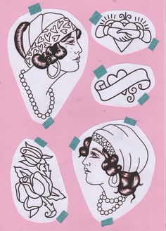 some stickers that are on top of a piece of paper with different types of tattoos