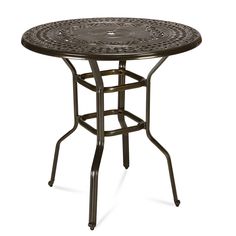 an outdoor table that is made out of metal and has a circular design on the top