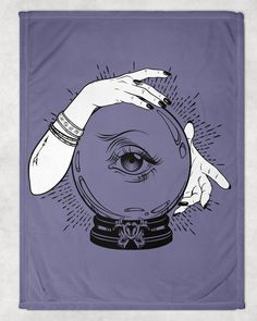 a purple blanket with an image of two hands holding a crystal ball