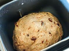 an uncooked dough in a metal pan