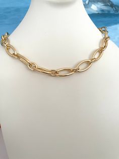 FREE SHIPPING!   This is a beautiful 24k Gold Filled Oval Link Chain Necklace with Push Gate Clasp  Available in your choice of custom length.  Your selected length is the total length of the chain you will receive. May be worn as a lariat or regular necklace and adjusted at your preferred length with push ring clasp.   Essentially two necklaces in one, so versatile! This piece has substantial weight. Stunning and so on trend! Available in white gold filled on request.  To keep your jewelry in e Oval Yellow Gold Chain Necklace With Adjustable Chain, Gold Plated Oval Chain Necklace, Gold Toggle Necklace With Oval Link Cable Chain, Elegant Chunky Chain Lariat Necklace, Gold Chunky Chain Oval Jewelry, Elegant Lariat Necklace With Chunky Chain, Elegant Oval Chain Necklace With Lobster Clasp, Formal Oval Chain Necklace With Lobster Clasp, Gold-tone Oval Jewelry With Gold Chain