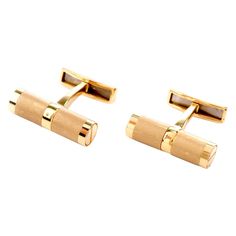 These collectable no longer in production Bvlgari cufflinks were inspired in a Dowel and Screw motif and crafted in 18 Karat gold. An alternating satin and high polish finish adorn the pattern. Measure appx. 6.26mm x 20.95mm. Stamped Bvlgari, 750 and 1897 AR. Condition: Excellent. Rose Gold Cufflinks, Onyx Cufflinks, Diamond Cufflink, Watch Cufflinks, Gold Cufflinks, Vintage Cufflinks, Gold Details, Estate Jewelry, Jewelry Branding