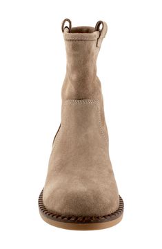 Side pull-tabs offer easy entry on a supple suede bootie grounded by a cushioned footbed and low block heel. 1 1/4" heel 6 1/2" shaft Pull-on style Cushioned footbed with arch support Leather upper and lining/rubber sole Made in Turkey Brown Suede Mid-calf Boots With Suede Lining, Suede Boots With Stacked Low Heel, Suede Ankle Boots With Medium Width, Suede Medium Width Ankle Heeled Boots, Suede Ankle Boots Medium Width, Medium Width Suede Ankle-high Moto Boots, Suede Ankle Moto Boots With Suede Lining, Suede Chelsea Boots With Heel Pull Tab, Suede Chelsea Boots With Reinforced Heel And Medium Width