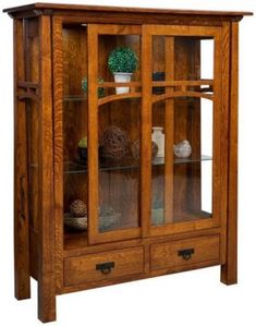 a wooden china cabinet with glass doors and drawers