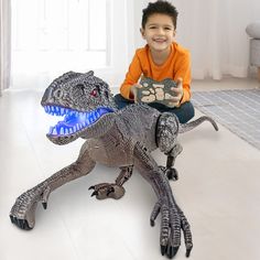 PRICES MAY VARY. 【Ideal Dinosaur Toys for Kids】ONG NAMO Remote Control Dinosaur Robot made with flexible joints, perform high-simulated walking and roaring sound with flexible movements, bring your kids to the jurassic world journey. 【Realistic Roaring with Vivid LED Light】Special light wave in Dinosaur Robot's mouth flash when it's roaring and walking. Various sound effects with different actions, imaging a real T-rex dinosaur is running around. Best RC Dinosaur Toys for Kids /Boys /Girls. 【Spe Dinosaur Velociraptor, T Rex Toys, Cool Toys For Boys, Robot Dinosaur, Dinosaur Toys For Kids, Core Memories, Company Christmas Party, Jurassic World Dinosaurs, Kids Electronics