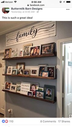 the wall is filled with family pictures and books on it's shelves, along with other personalized items