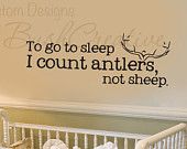 a wall decal with the words to go to sleep i count antlers not sheep