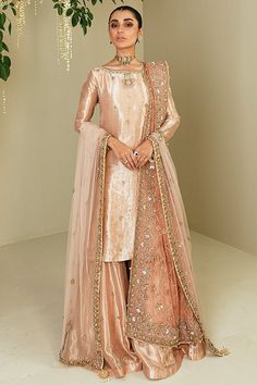 Buy The latest Pakistani Bridal Sharara Suit in Tissue adorned with classic designs and embellishments. This beautiful Sharara Dress is available Online. Bridal Sharara, Pakistani Bridal Dress, Shadi Dresses, Desi Wedding Dresses, Nikkah Dress, Pakistani Wedding Outfits, Pakistani Fancy Dresses, Desi Clothes, Pakistani Bridal Dresses