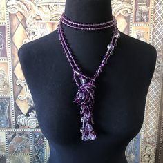 ON SALE Very pretty long purple and clear glass statement necklace that is in excellent vintage condition. Measures 116 inches long which is nice because you can wear it in so many different ways. Very classic addition to any wardrobe or high-end jewelry collection. Elegant Purple Necklace For Party, Elegant Multi-strand Crystal Necklaces For Parties, Elegant Multi-strand Crystal Necklace For Parties, Purple Crystal Necklaces For Party, Elegant Long Purple Necklace, Elegant Purple Necklace With Faceted Beads, Elegant Purple Necklaces With Faceted Beads, Elegant Multi-strand Purple Beaded Necklaces, Purple Multi-strand Necklace For Party