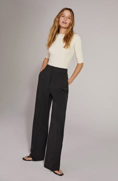 Polish off your ensemble in these stretch-kissed wide-leg pants featuring convenient pockets and a chic high rise. 34" inseam; 25" leg opening; 15" front rise; 19" back rise (size 18) Zip fly with hook-and-bar closure Front slant pockets; back welt pockets 63% polyester, 32% rayon, 5% spandex Machine wash, tumble dry Imported Flat Front Pants Women, Modern Wide Leg Pants With Welt Pockets, Fall Wide Leg Pants With Welt Pockets, Fitted High Waist Wide Leg Pants In Modern Style, Fitted High Waist Wide Leg Modern Pants, Loosely Fitted Wide Leg Pants For Work, Fitted High Waist Modern Wide Leg Pants, Fitted High Waist Wide Leg Pants, Stretch Wide Leg Full-length Pants With Welt Pockets