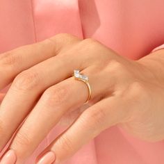 The Baguette V Stacking Ring is perfect stack for your classic solitaire rings. Its chic and minimal design will make it an essential piece for you. - Made in 14k solid gold - Decorated with handset white cubic zirconia stone on 14k solid gold - Band Width: 1.15 mm / 0,045 inches - Top Width: 12.33x8.10 mm / 0,485x0,318 inches - Thickness: 1.38 mm / 0.054 inches -This product comes with iconic Norm Jewels gift box Classic Solitaire Ring, Luxury Jewelry Brands, Solitaire Rings, Solid Gold Band, Gold Decor, Baguette Cut, Dream Ring, Stacking Ring, Gold Band